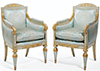 Pair of Northern Italian, Neoclassical period, blue-painted and parcel-gilded bergeres