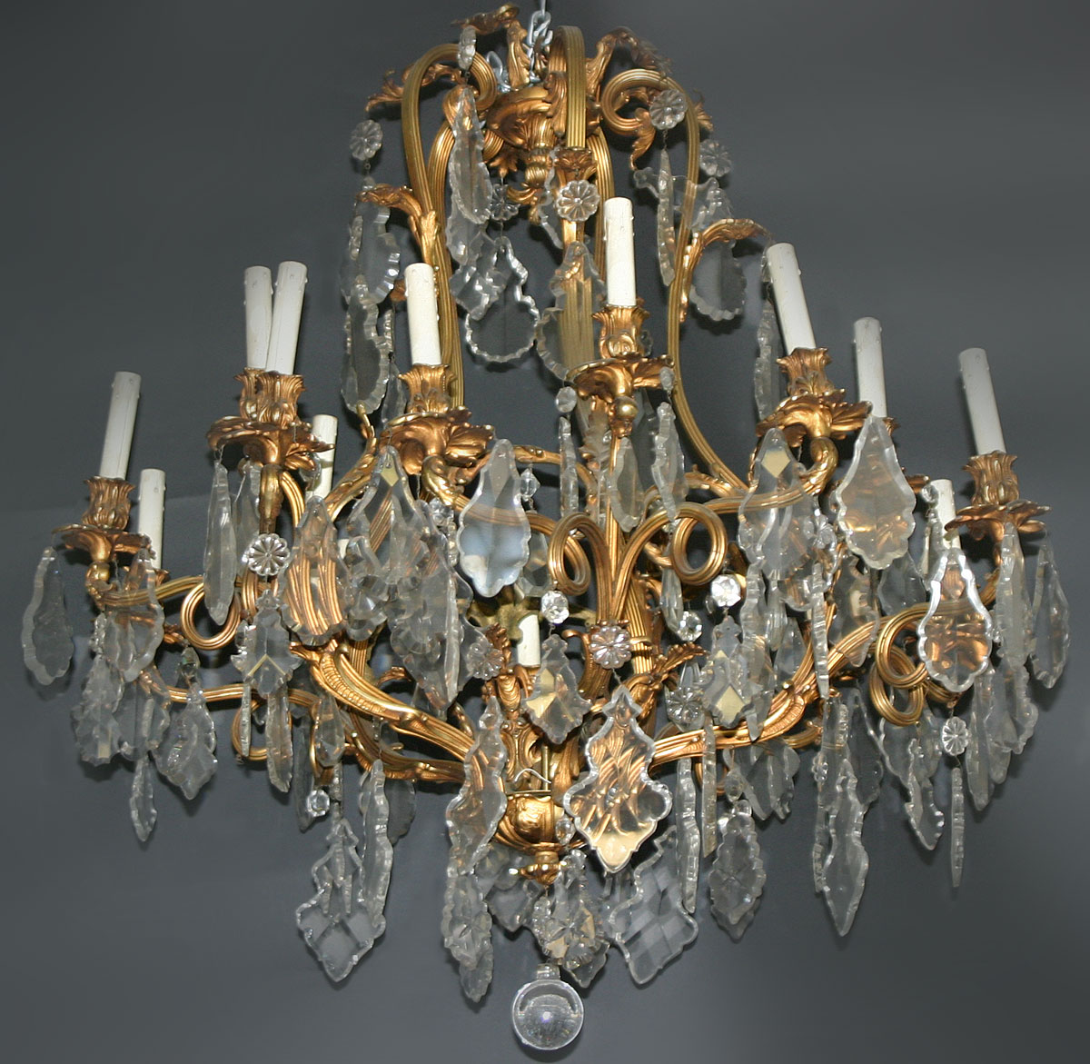 French, Louis XV style, bronze d'ore and cut glass, twelve-light chandelier