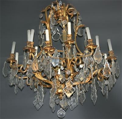 French, Louis XV style, bronze d'ore and cut glass, twelve-light chandelier