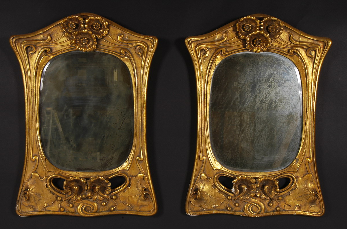 Rare pair of Art Nouveau period, carved, giltwood mirrors