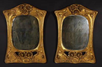 Rare pair of Art Nouveau period, carved, giltwood mirrors