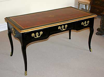 Italian, Regence period, black lacquer and gilt bronze bureau plat