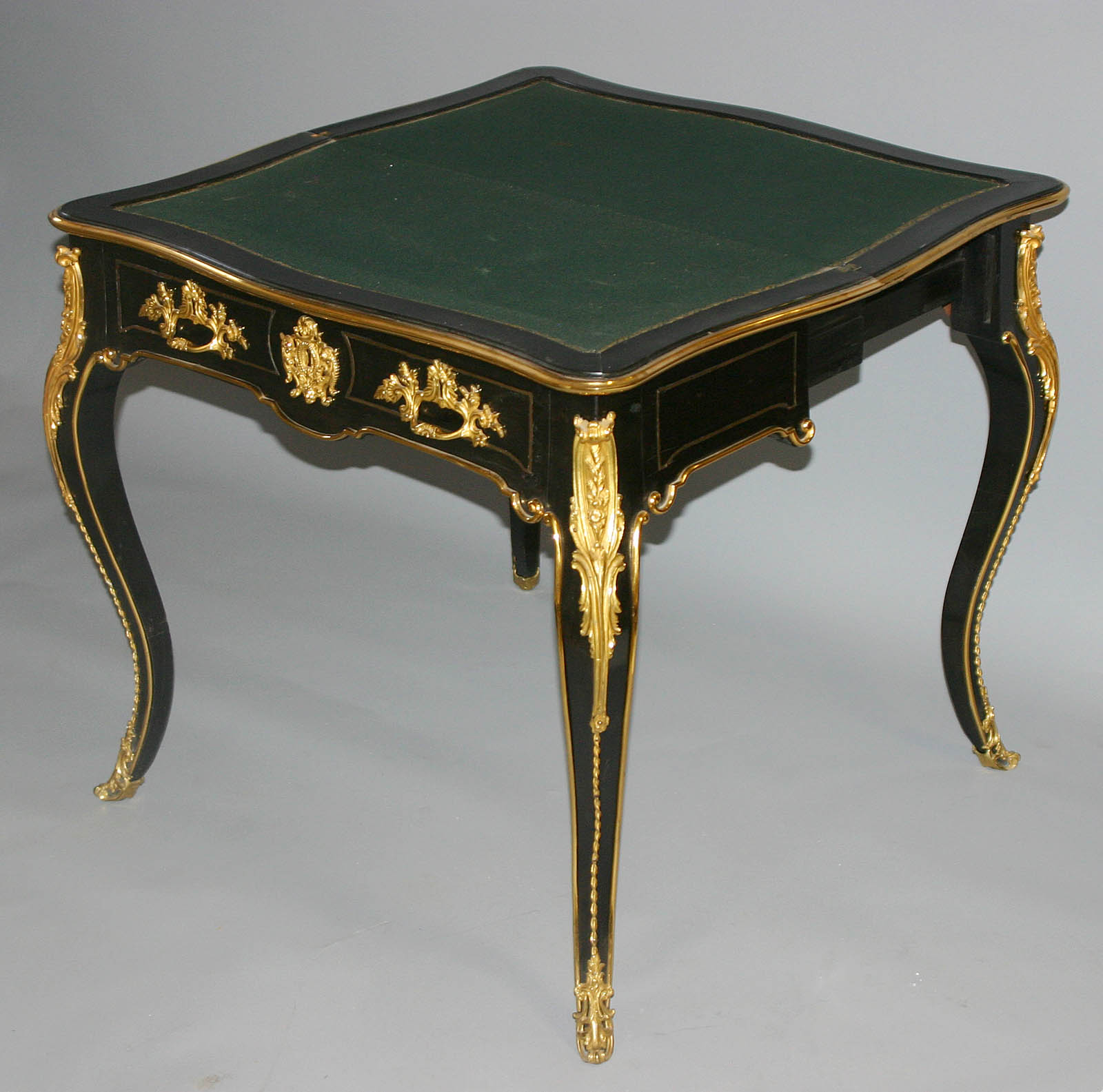 Fine, French, Napoleon III period, black lacquer, gilt bronze, and incised gilt brass table a jeu (game table)