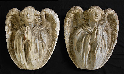 Set of four plaster corbels