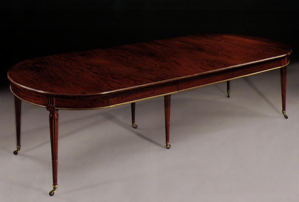 Very  fine, French, Louis XVI style, brass-mounted, dining table